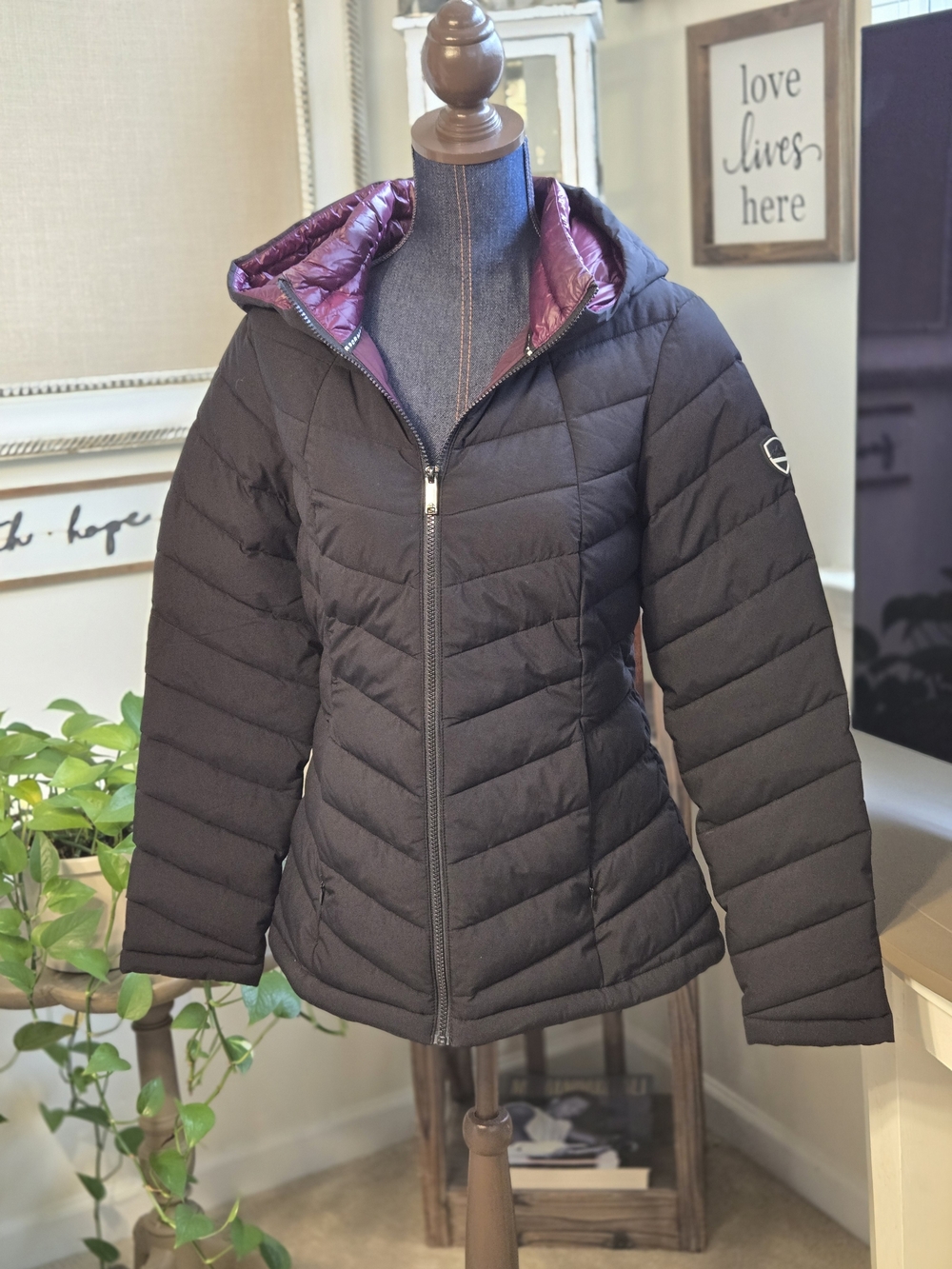 Women’s Black Puffer Jacket with Contrasting Purple Hood Lining